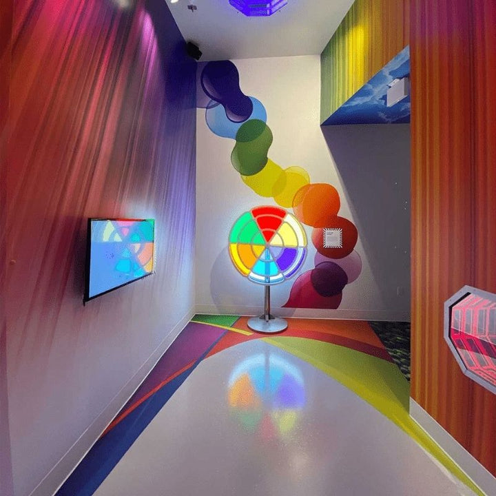 LiteZilla Chroma Wheel colour theory STEM exhibit positioned in an educational or school environment