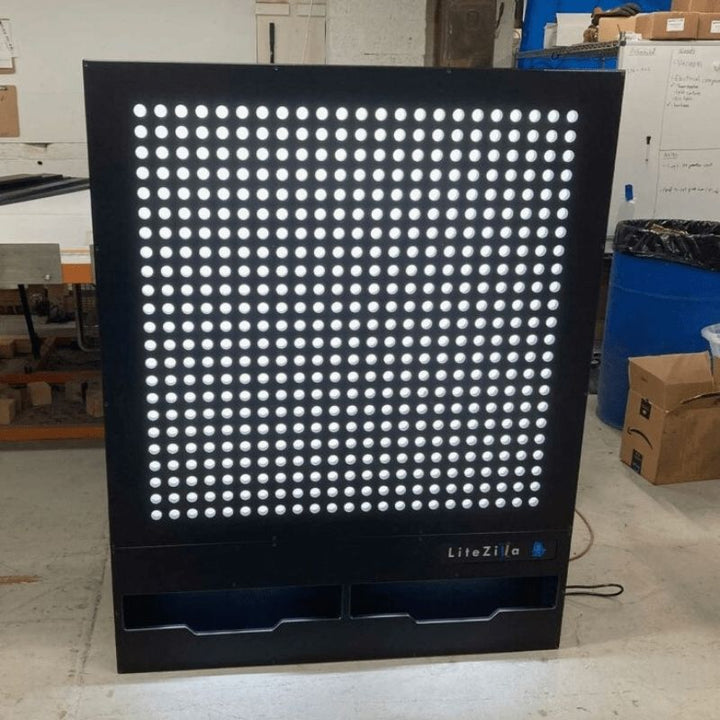 LiteZilla Giant Lite Brite front view with lights off, showing the black HDPE frame and LitePin grid structure