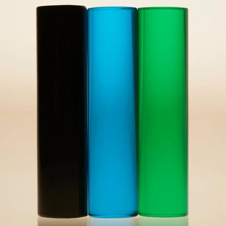 LiteZilla LitePins set showing Sea Blue, Opaque Black and Emerald Green acrylic pins for use in the LiteZilla Giant Lite Brite sensory light wall