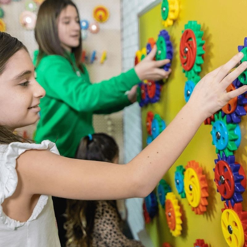 LiteZilla MagWiz Magnet Wall installed in a play space, showing the full interactive magnetic sensory wall surface