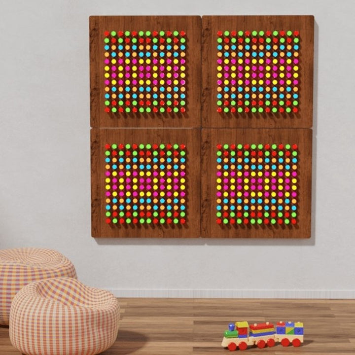 LiteZilla Mini in landscape wall-mounted configuration, showing the interactive lite brite installed in a sensory or classroom space