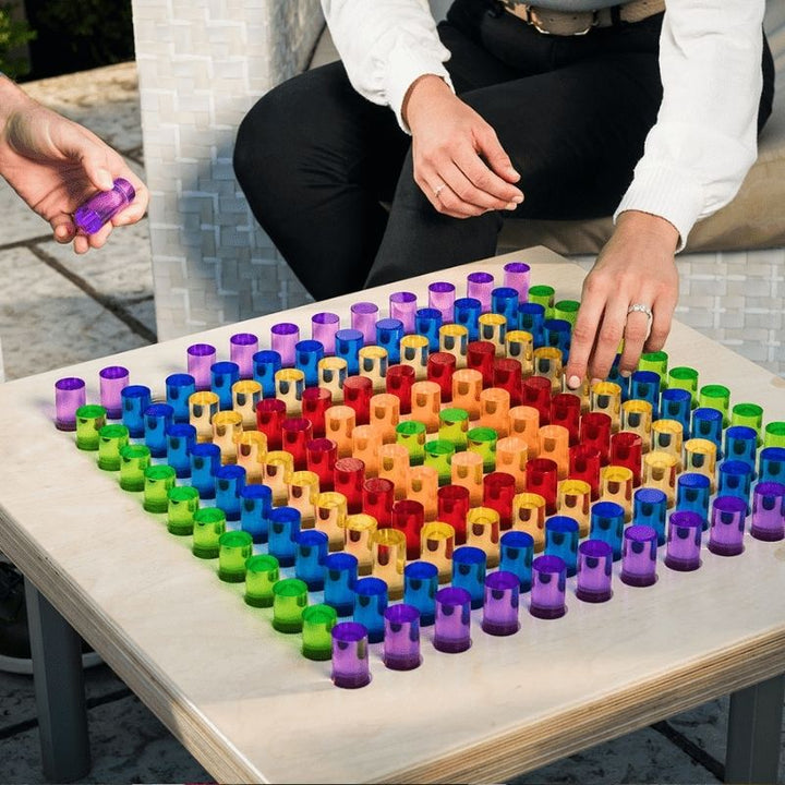 Top-down view of the LiteZilla Mini showing the backlit grid filled with coloured LitePins in a creative pattern