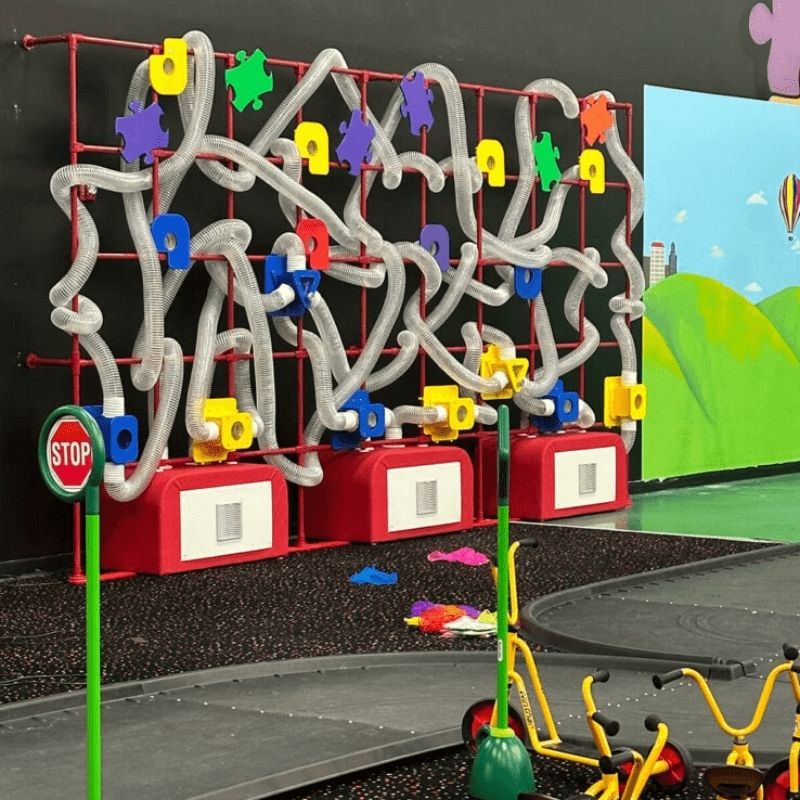 LiteZilla Ultimate Scarf Launcher full side view of clear tube sensory exhibit for STEAM and interactive play environments