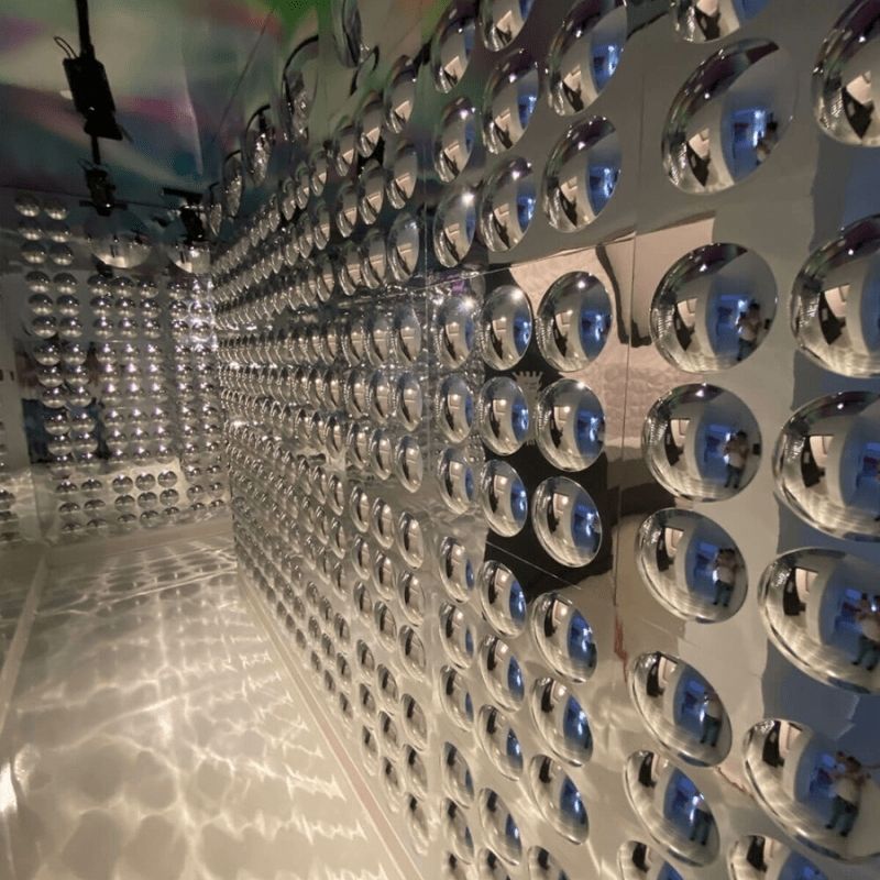 LiteZilla Sensory Bubble Mirror Panel mounted on a silver wall, demonstrating the 20x20 convex acrylic mirror panel in a sensory room installation
