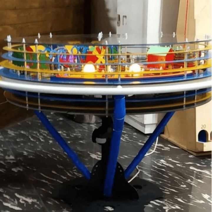 Detail view of the LiteZilla Twistopia Tabletop Labyrinth wraparound handlebar and tilt mechanism, the key control interface that builds hand-eye coordination and fine motor precision through active maze play