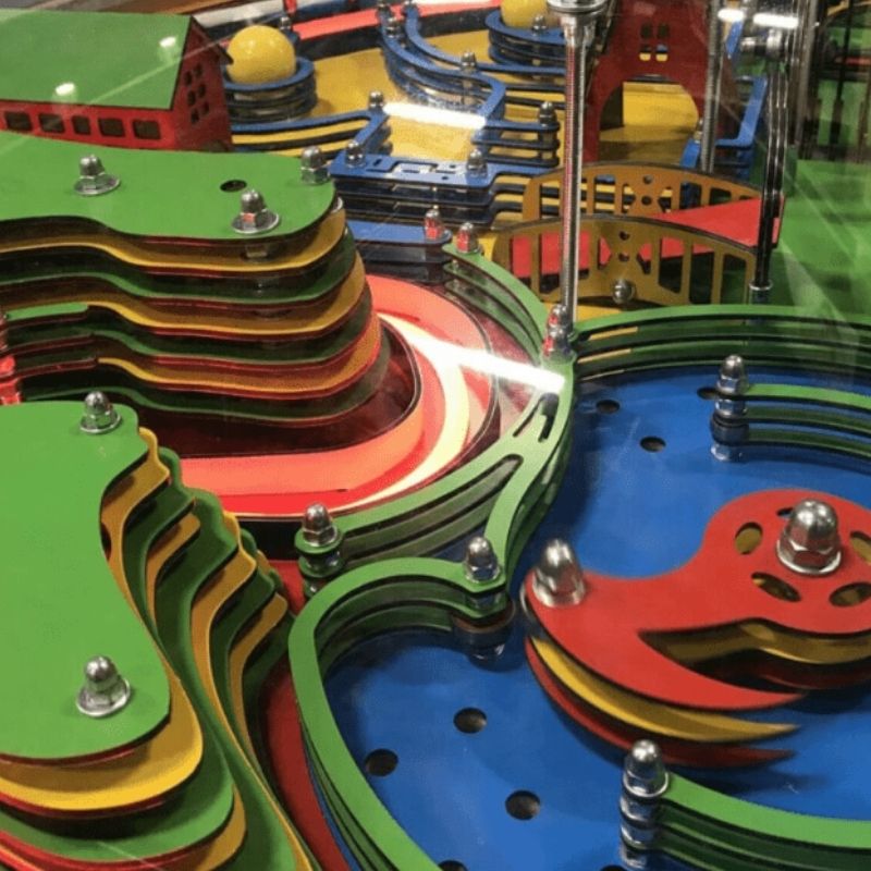 Close-up detail of the LiteZilla Twistopia Tabletop Labyrinth internal maze pathways with lights and moving elements, supporting hand-eye coordination and problem-solving play