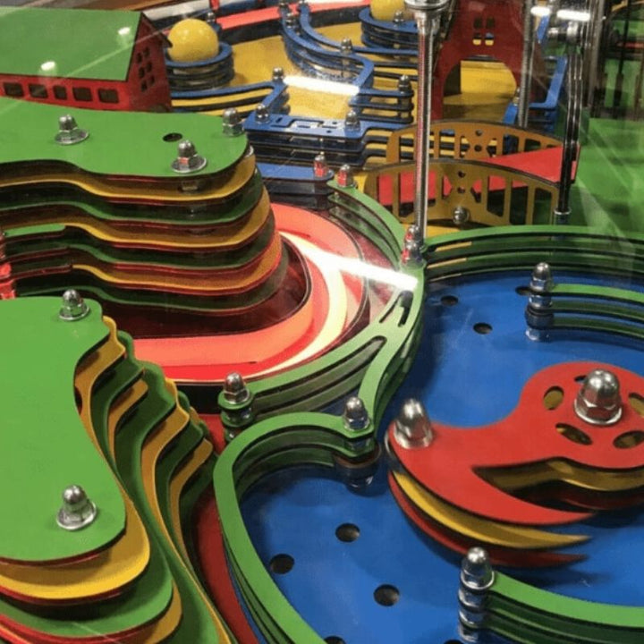 Close-up detail of the LiteZilla Twistopia Tabletop Labyrinth internal maze pathways with lights and moving elements, supporting hand-eye coordination and problem-solving play