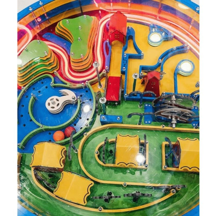 Overhead view of the LiteZilla Twistopia Tabletop Labyrinth themed circular maze board with ball and obstacle layout, designed to develop fine motor skills and critical thinking for all ages