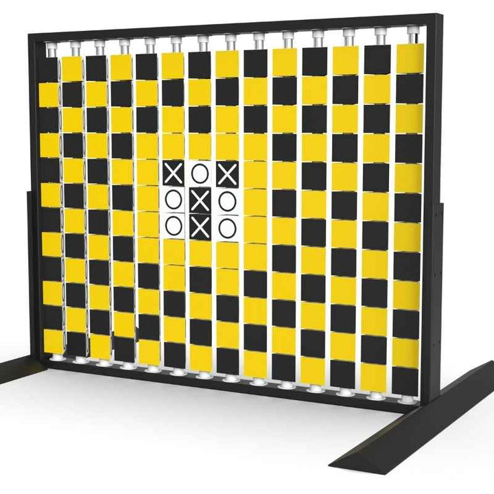 Angled view of the LiteZilla Mosaico Wall freestanding rotating wall panel with a built in tic tac toe game on yellow, black and white triangles