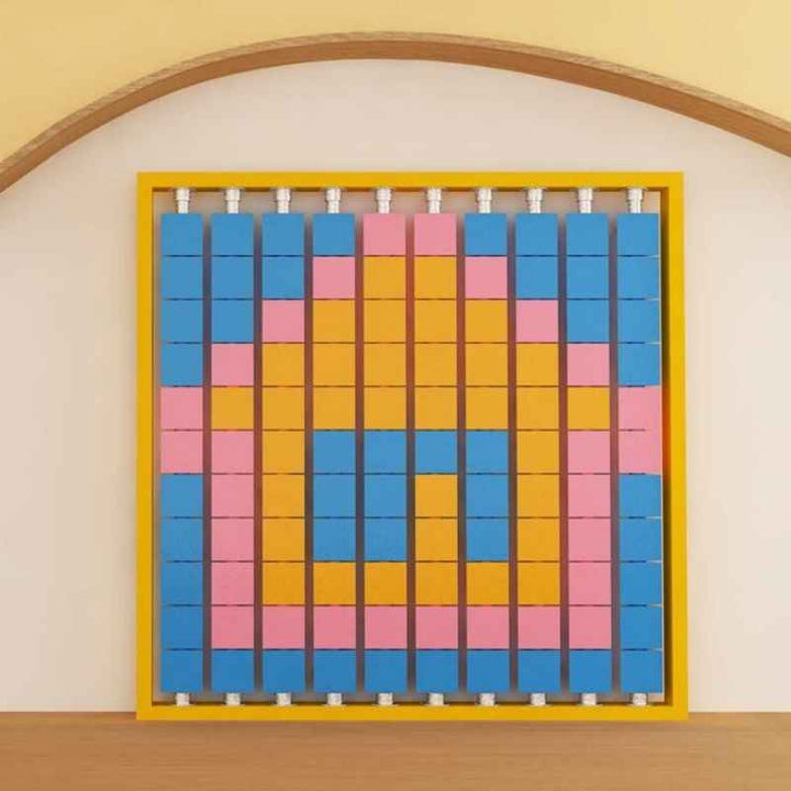 LiteZilla Mosaico Wall large format rotating wall panel in blue, pink and orange tiles mounted in an interior alcove
