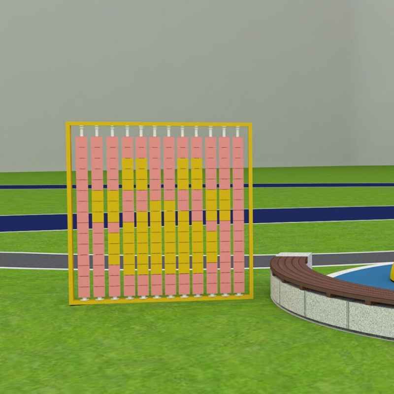 LiteZilla Mosaico Wall rotating wall panel installed near an outdoor playground with pink and yellow square tiles