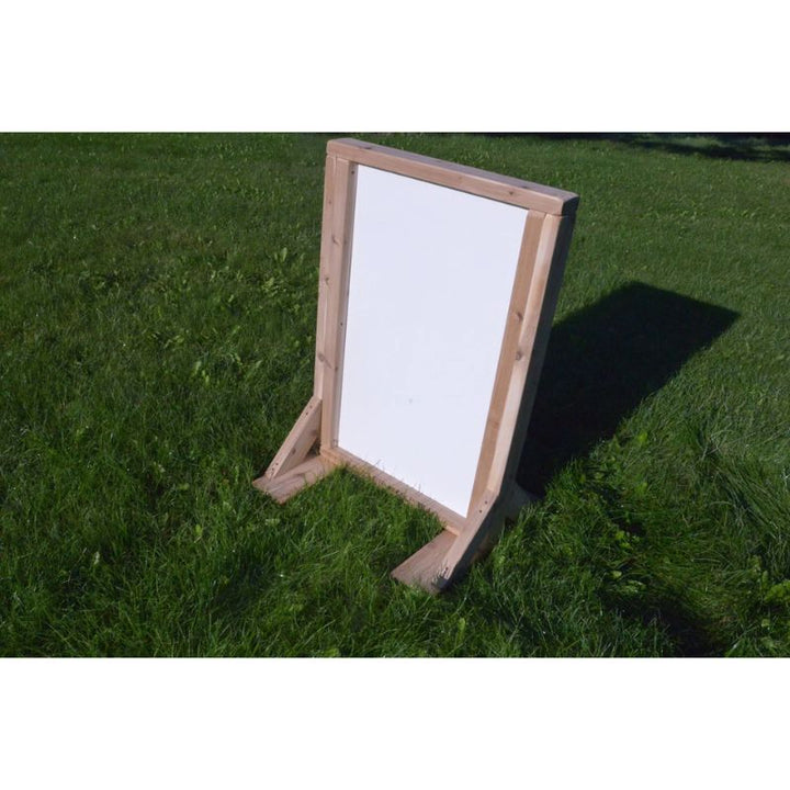 ONP Double Sided Art Easel showing the whiteboard and plexiglass panel side, an outdoor cedar art easel for toddler and preschool creative play and mark making
