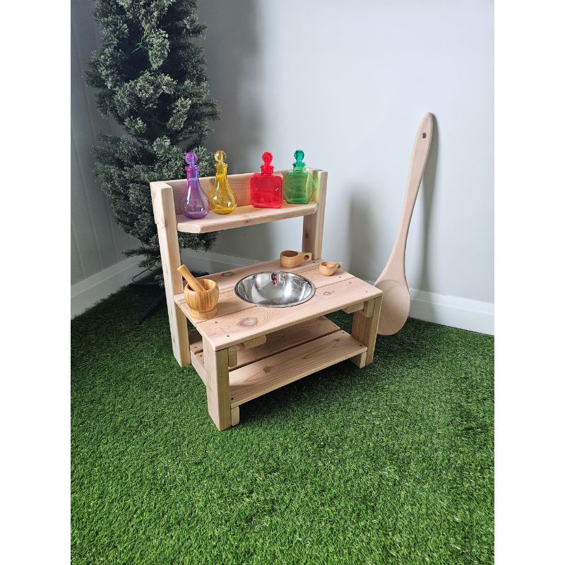ONP Mini Mud Kitchen front view showing the Western Red Cedar construction, aluminium bowl, and lower storage shelf - a compact outdoor mud kitchen for toddlers at 24 inches long, ideal for small outdoor spaces across Canada and the US