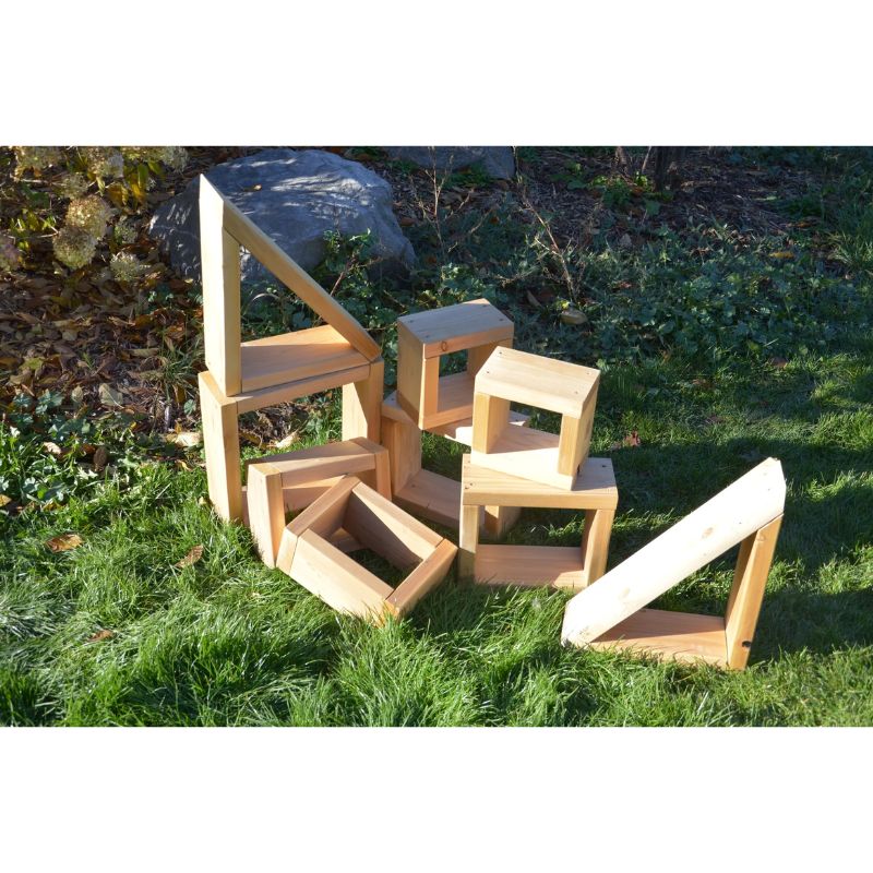 ONP 9-piece outdoor cedar block set in front portrait view, displaying the natural Western Red Cedar construction and open-base shapes for open-ended outdoor block play