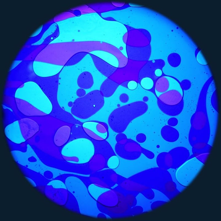 OPTIKinetics 6 inch Liquid Effect Wheel Blue Moon displaying its blue-toned oil projection effect for serene visual stimulation in multi-sensory environments and therapy rooms