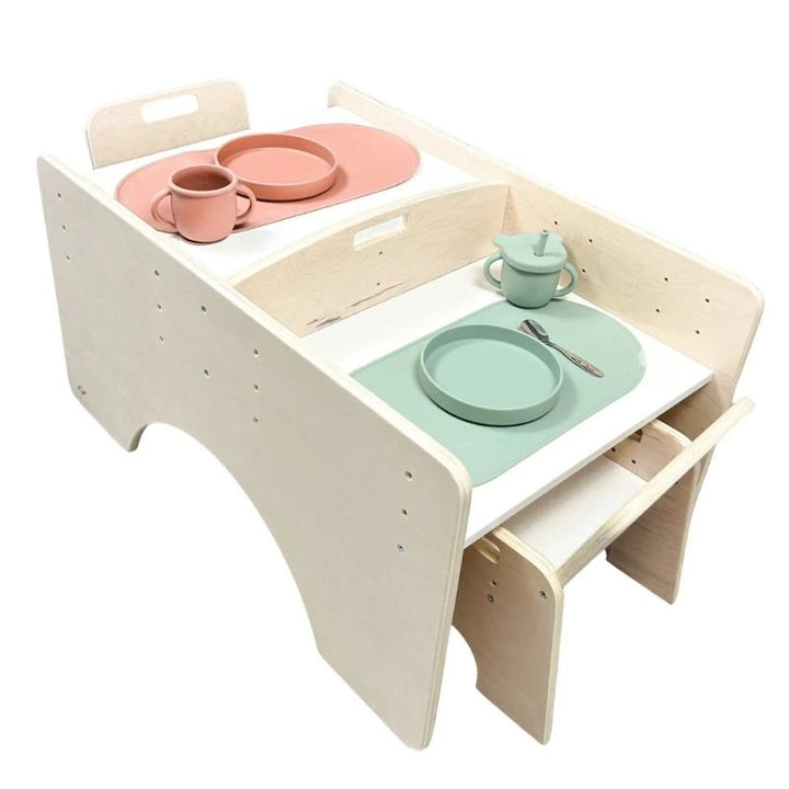 Sapiens Child Papaya Double Montessori Table and Chair Set in landscape view with a table setting for two children, showing the weaning table functionality for independent mealtimes