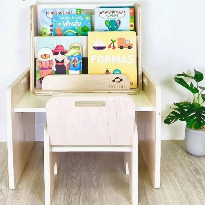 Boy child engaged in active play at the Sapiens Child Papaya Set Montessori table from a side view, showing the adjustable chair and table height positioning for independent child-height work