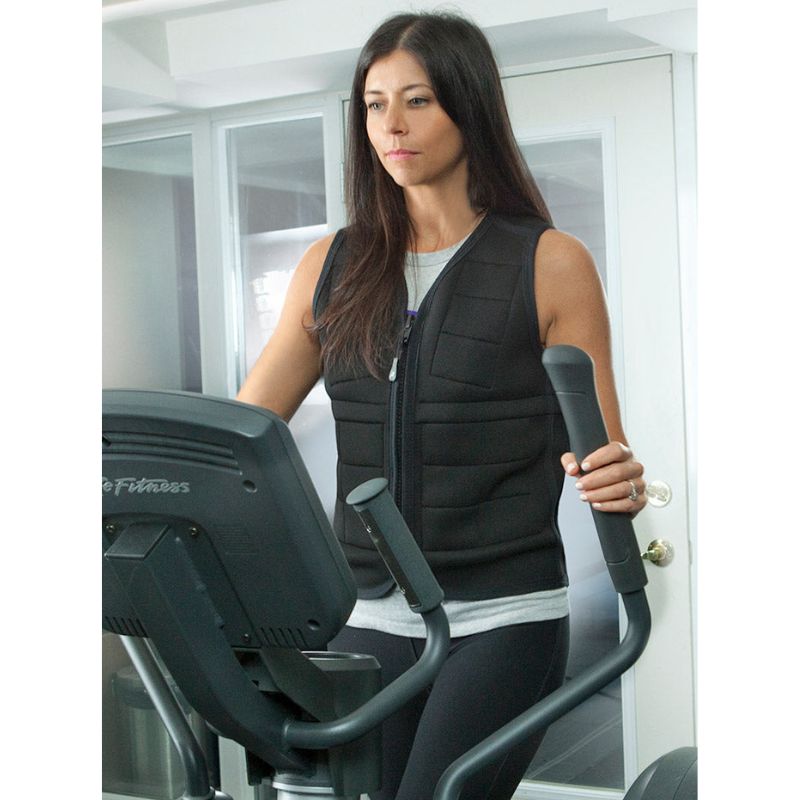 Adult female wearing the Power WearHouse weighted vest during a workout, supporting calorie burn and cardiovascular fitness