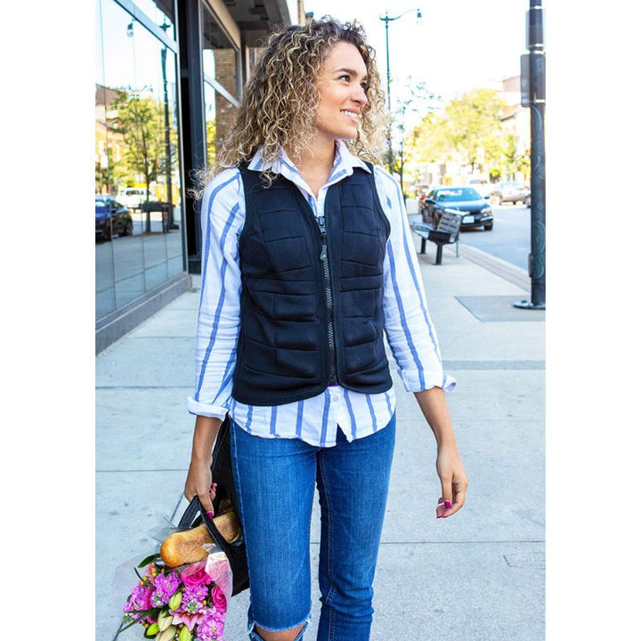 Adult female wearing the Power WearHouse deep pressure vest while grocery shopping, demonstrating all-day wearability