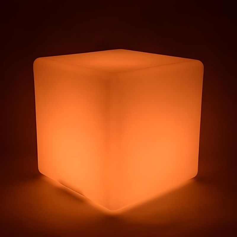 ROYLCO LED Colour Changing Light Cube in orange light mode, demonstrating the vibrant colour range of this portable 16-colour sensory light cube for classrooms and home use