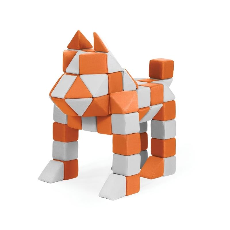 A dog figure built from JollyHeap Creative Set soft magnetic blocks in orange and grey with pointed triangle ear piecesuild