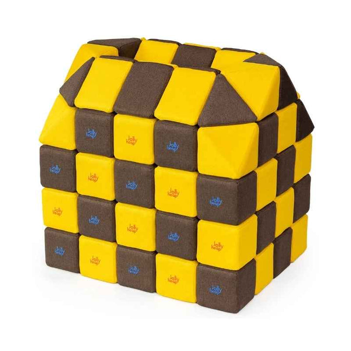 A small structure built with JollyHeap Creative Set soft magnetic blocks in a yellow and dark brown colour combination