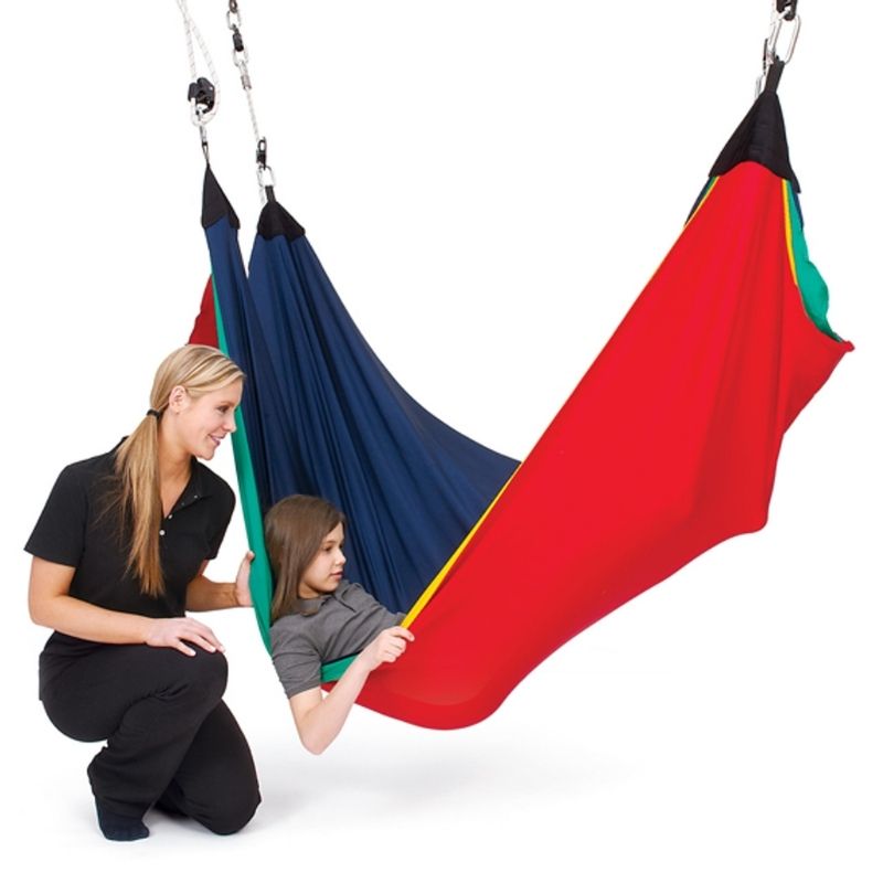 Child using the Southpaw Rainbow Acrobat Swing with an adult, demonstrating the multi-layer Lycra sensory swing for vestibular and proprioceptive therapy input