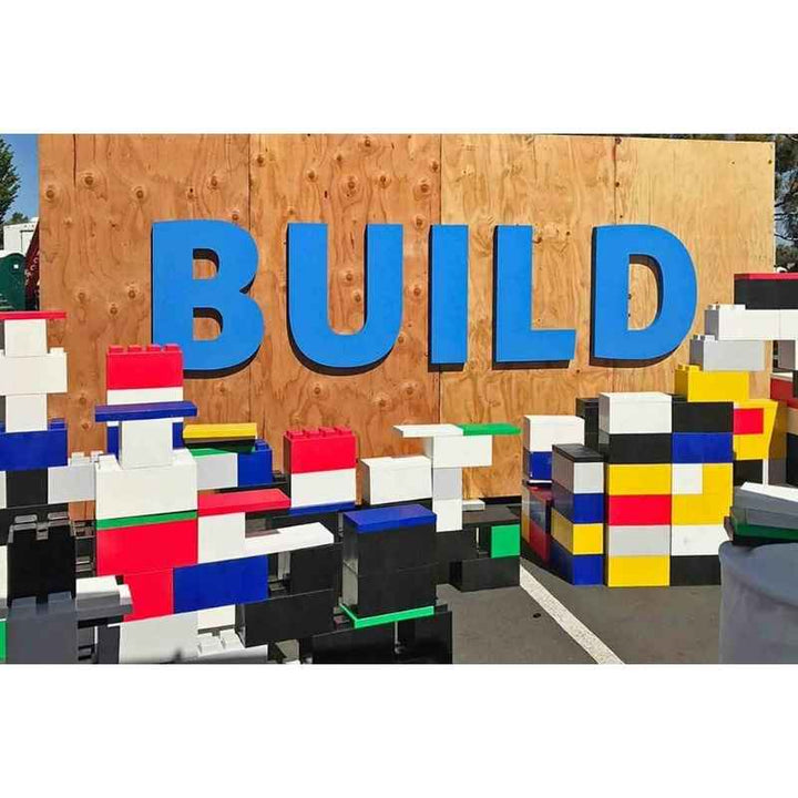 EverBlock giant building blocks arranged beneath a BUILD sign for a STEM building activity display