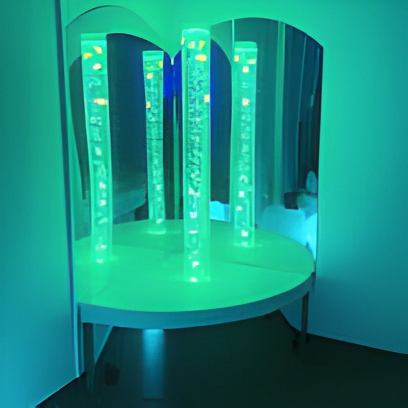 TFH Bubble Tube Curved Sensory Corner with 48-inch aquarium bubble column, curved padded podium, and two acrylic mirrors, a complete sensory room corner kit for therapy, school, and home