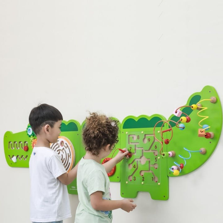 TFH Crocodile Activity Wall Panel showing all 5 panels mounted, an 11-activity sensory busy board for fine motor and auditory development in classrooms and therapy rooms