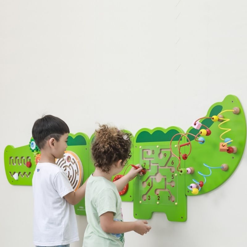 TFH Crocodile Activity Wall Panel showing all 5 panels mounted, an 11-activity sensory busy board for fine motor and auditory development in classrooms and therapy rooms