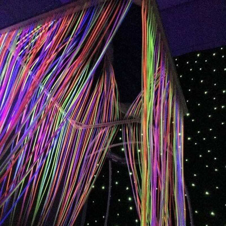TFH Fibre Optic Waterfall ceiling view with multicoloured fibre optic tails radiating outward from the mirrored 24-inch square shelf, showing the sparkle colour-cycle effect