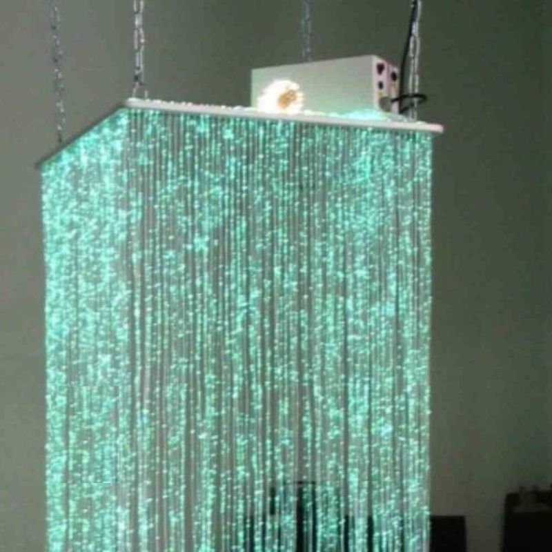 TFH Fibre Optic Waterfall in a full sensory room landscape view, showing the ceiling-suspended 200-tail installation creating an immersive colour-changing light environment