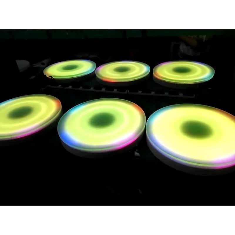 Close-up of the TFH Illuminated Floor Splot sensory light tile surface showing LED colour response