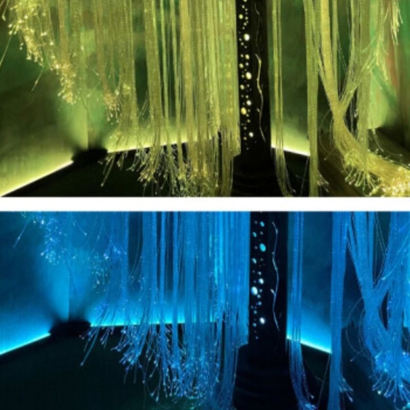 TFH Genie Colour Wash Kit displaying apple green and blue LED light strips, showing the expandable sensory room lighting system across a wall surface