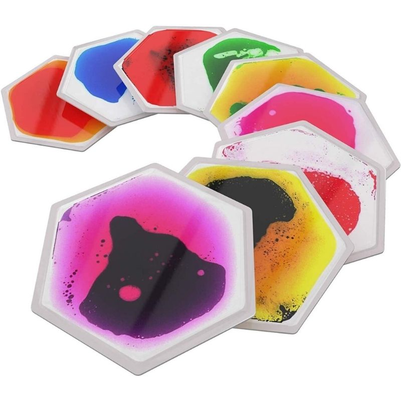 TFH Hexagon Liquid Floor Tiles 9 Set in a spiral floor arrangement, demonstrating the flexible no-installation layout options for sensory rooms, classrooms, and therapy spaces
