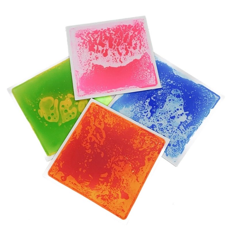 TFH Large Square Liquid Floor Tiles 4 Set in use, showing the colour-shifting liquid gel response to pressure across the 50cm square sensory tile surface