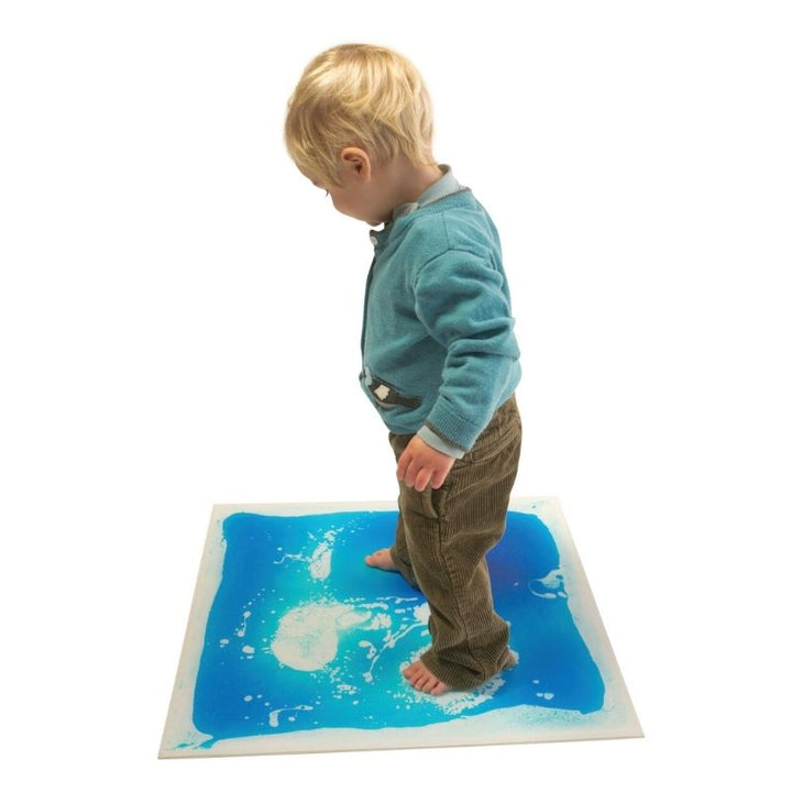 TFH Large Square Liquid Floor Tiles 4 Set demonstrating the flush edge-to-edge arrangement of 50cm square gel tiles for sensory room and classroom floor use