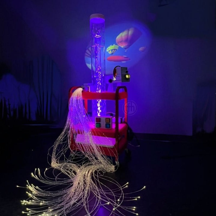 TFH Little Red Sensory Cart Deluxe Hurricane Waterless full view showing the waterless hurricane snow bead tube, Solar 80 LED projector, and 100 fibre optic tails on the infection-control safe portable sensory station