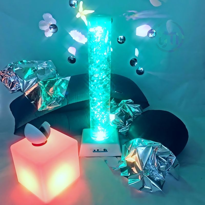 TFH Sensory Room Kit Starter Package displayed on blue background including bubble tube, projector, bean bag and mood cube