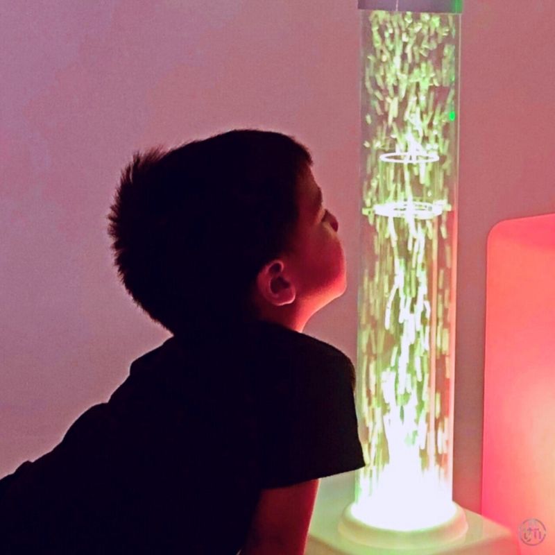 TFH Tabletop Hurricane Tube Waterless from an alternate angle, showing the compact 4" diameter column and 8" base for portable sensory use in classrooms, therapy rooms and home