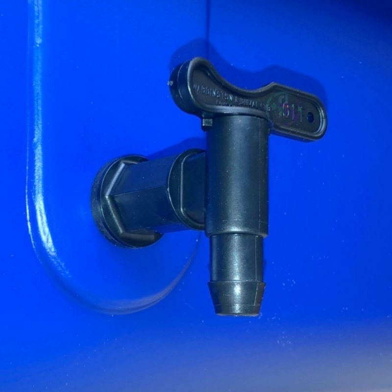 Close-up of the built-in drain tap on the TFH Wheelchair Accessible Sand and Water Table, showing the easy-drain feature for water well clean-up