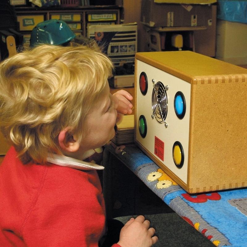 TFH Wind & Lights Discovery Panel showing the four illuminated primary colour buttons, a cause-and-effect interactive sensory panel for OT, classrooms and sensory rooms