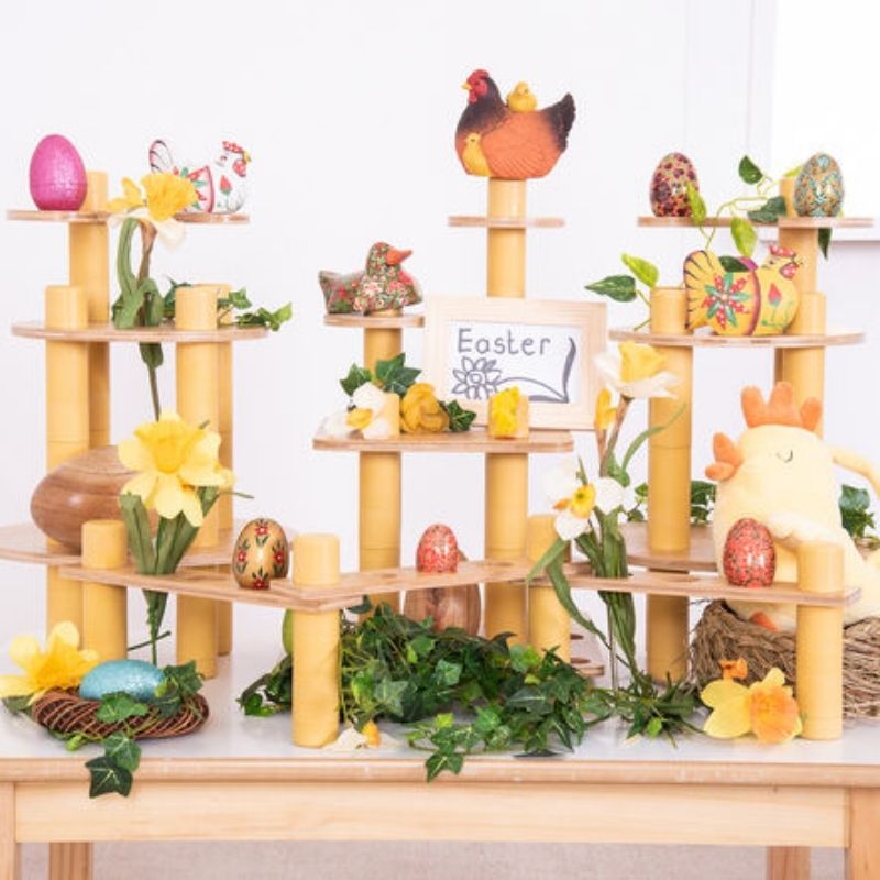 TTS Alice Sharp Eco Build a World set arranged as a small world scene with houses, trees, and landscapes built from the 86-piece sustainable loose parts collection