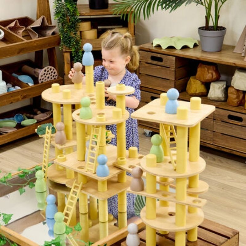 TTS Alice Sharp's Eco Build a World 86-piece sustainable loose parts set laid out showing bamboo bases, wooden pulp tubes, and recycled plastic joiners for open-ended STEAM play