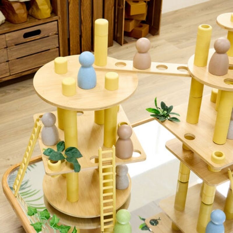 TTS Alice Sharp's 86-piece eco construction set in use during STEAM play, showing children building structures with sustainable bamboo and recycled plastic pieces