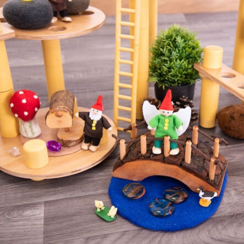 Child using TTS Alice Sharp Eco Build a World pieces to develop fine motor skills through hands-on construction and small world imaginative play