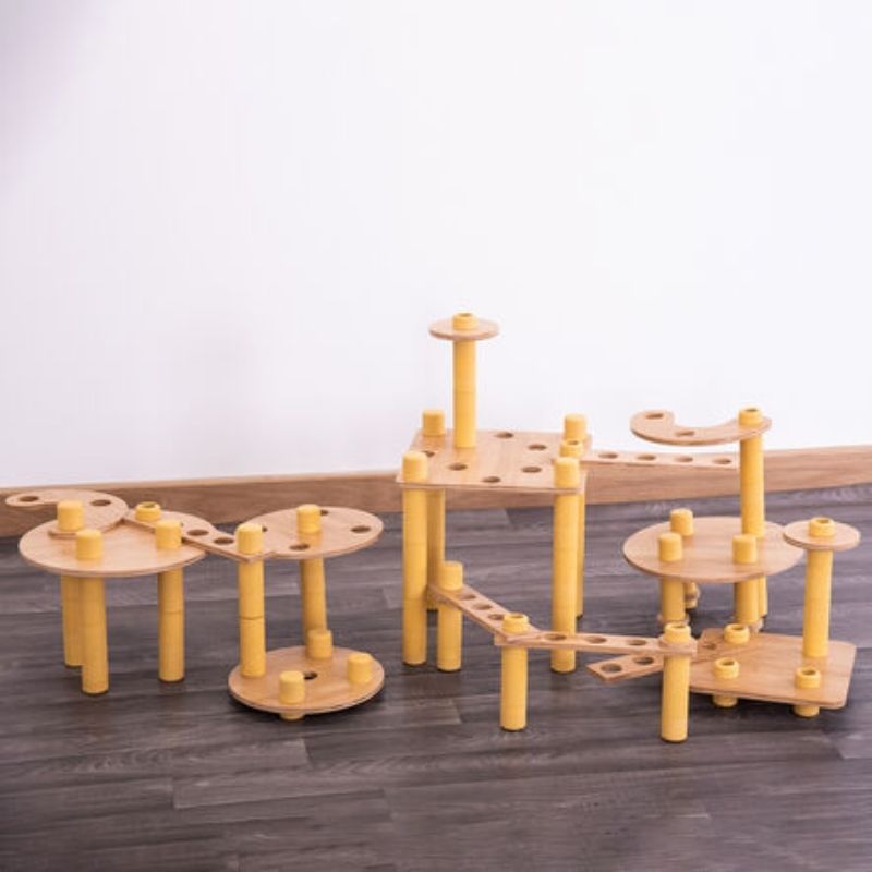 TTS Alice Sharp Eco Build a World pieces arranged into pathways and sculptures, showcasing the open-ended construction possibilities of this sustainable loose parts set