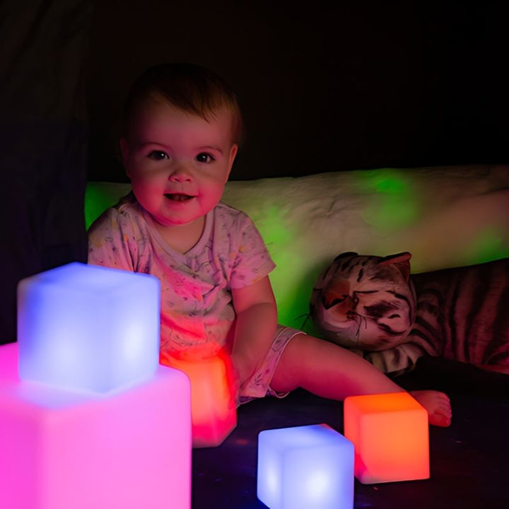 TTS Light-Up Bolster Cushions included in the Calming Sensory Pod Starter Collection, offering glowing visual input and proprioceptive support for children during sensory calming time
