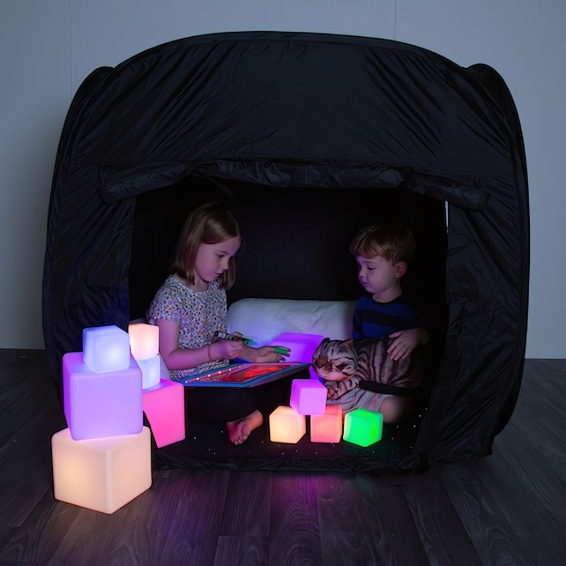 TTS Calming Sensory Pod Starter Collection laid out showing all 26 pieces including the Mini Pop-Up Sensory Pod, Fibre Optic Sparkle Rug and sensory tools for calm corners and therapy rooms